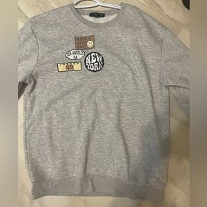 Grey crewneck sweater